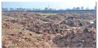 A heap of pond soil in the sports field sachkahoon